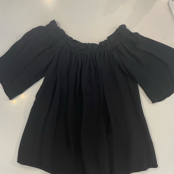 Flowy black French Connection top.  Off the shoulder or covered shoulders. - Picture 2 of 3